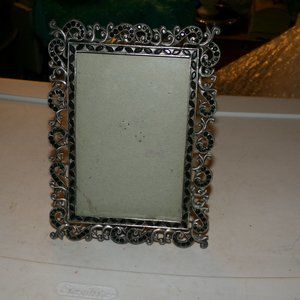 vintage metal &glass frame with gems.
